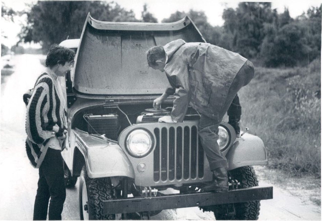 1969-photo-forest-ranger-fixing-jeep
