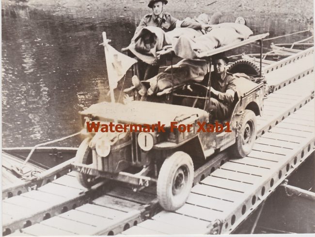 1944-07-29-wounded-jeep-bridge1