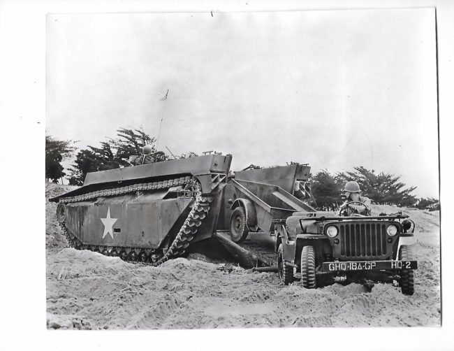 1945-11-jeep-exiting-water-buffalo-tractor1