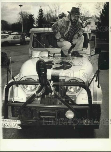 1978-11-bill-barriere-standing-on-jeep