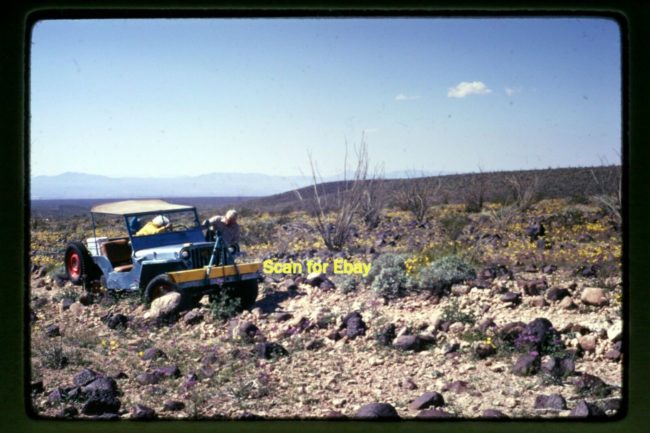 1973-photo-family-pushing-jeep-desert